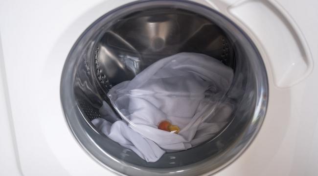 海尔洗衣机排污口怎么打开图解