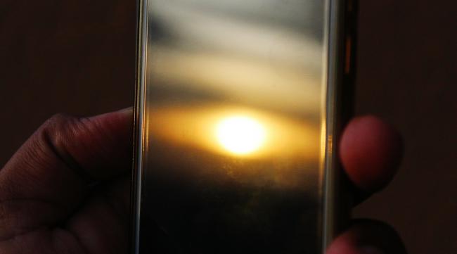 苹果手机如何拍出太阳光束照片