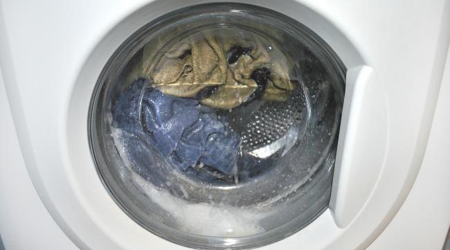 海尔全自动洗衣机排污口怎么拆卸